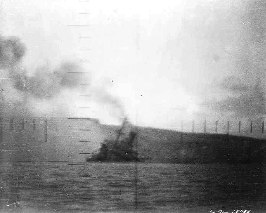 Ship trying to steam away after torpedo hit